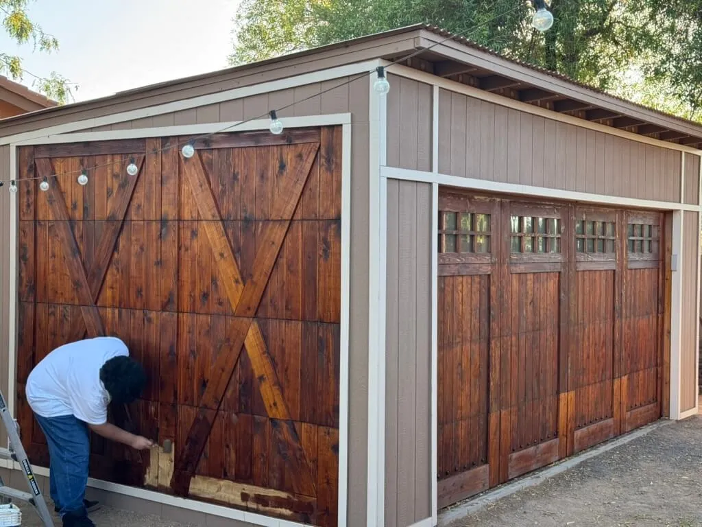 Custom wood carriage-style garage door on an ADU